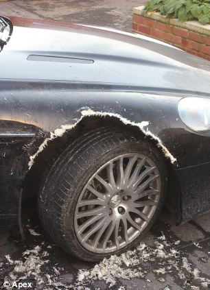 DB9 damaged wheel arch