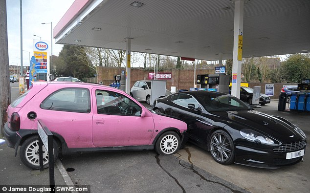 Pink Corsa crashed into black Aston Martin DBS - 2